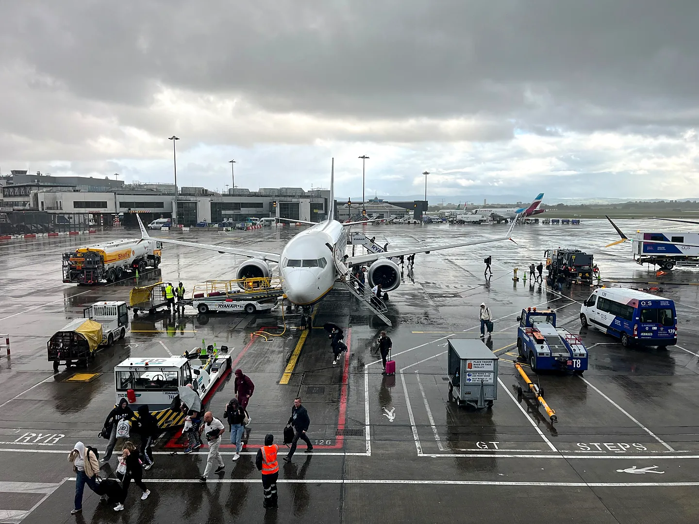 Ground handling operations around a passenger aircraft at an airport